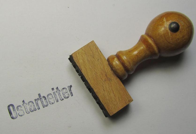 Wooden-based-, Eastern-volunteers-related 'ink-stamp' (or: 'Dienstsiegel'), depicting the text: 'Ostarbeiter'