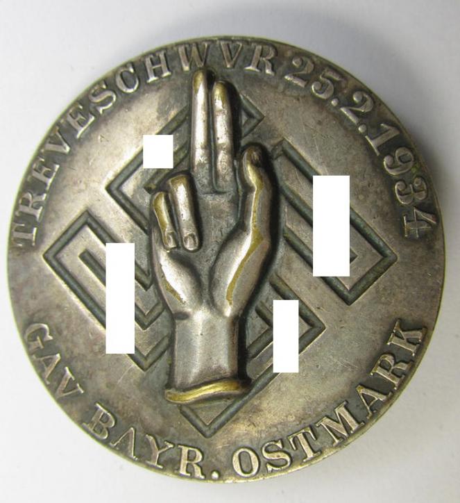 Commemorative - 'Buntmetall'-based-, N.S.D.A.P.-related 'tinnie', being a maker- (ie. 'Wächtler u. Lange'-) marked example depicting an oath-taking hand above a swastika surrounded by the text: 'Treueschwur 25-2-34 - Bayr. Ostmark'