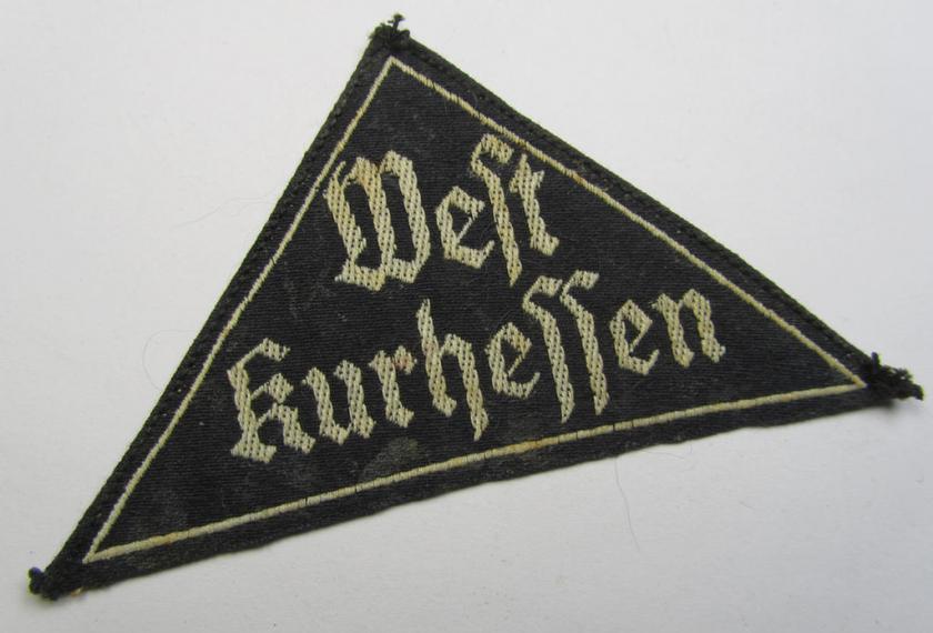 Rarely seen HJ/BDM (ie. 'Hitlerjugend' or: 'Bund Deutsche Mädel') district-triangle (ie. 'Gebietsdreieck') entitled: 'West Kurhessen' (being a virtually mint example that has lost its once present 'RzM-etiket')
