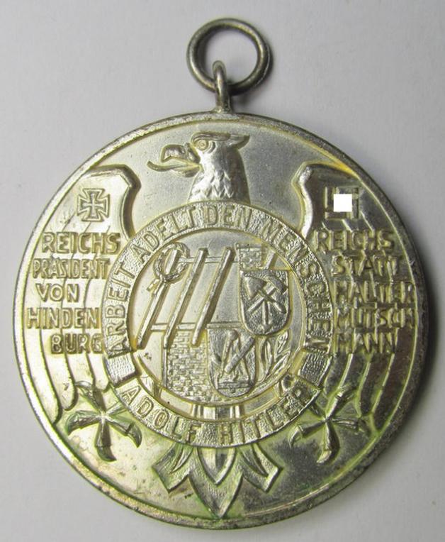 Bright-silver-toned, so-called: commemorative-medal (ie. 'Erinnerungs- o. nichttragbare Medaille') entitled: 'Arbeit adelt den Menschen - Adolf Hitler - 1924 - 1934'