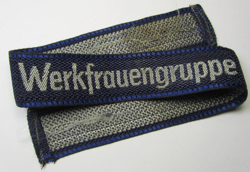 Very attractive - and/or full length ie. never worn! - flat-wire-constructed-, 'N.S.-Volkswohlfahrt' (N.S.V.) ie. 'Deutsches Arbeitsfront' (D.A.F)-related cuff-title (ie. 'Ärmelstreifen') entitled: 'Werkfrauengruppe'