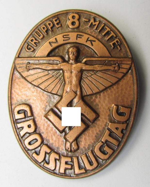Copper-bronze-toned, N.S.F.K.-related day-badge (ie. 'tinnie') being a non-maker-marked example as was issued to commemorate a specific meeting ie. national rally entitled: 'N.S.F.K. Grossflugtag der Gruppe 8 Mitte'
