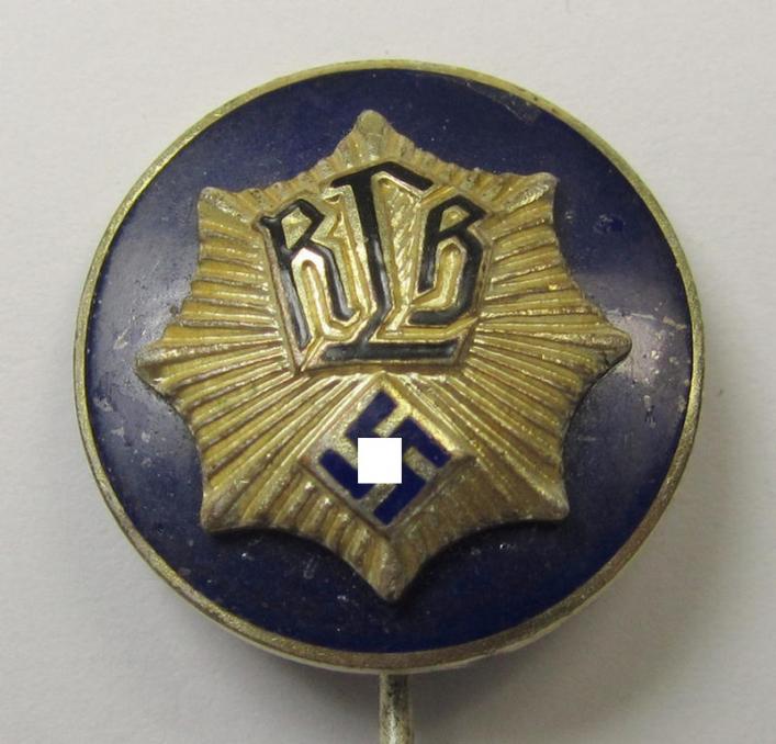 Rarely seen, neatly namelled 'RLB'- (ie. 'Reichluftschützbund') 'Amtsträgerabzeichen in Gold' (or: gold-class civil-attire badge of the first pattern) that is neatly maker- (ie. 'K. Würster'-) marked and bearing a patent-pending-designation