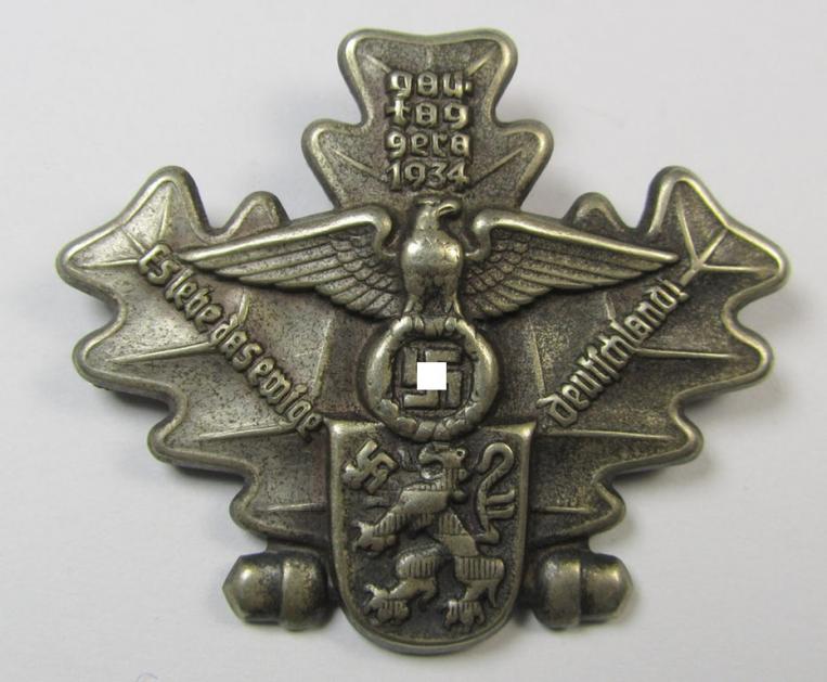 Commemorative, 'Buntmetall'-based- and/or: silver-coloured N.S.D.A.P.-related 'tinnie' being a non-maker marked example depicting a detailed eagle-device resting on a shield surrounded by the text: 'Gautag Gera 1934 - Es lebe das ewige Deutschland'