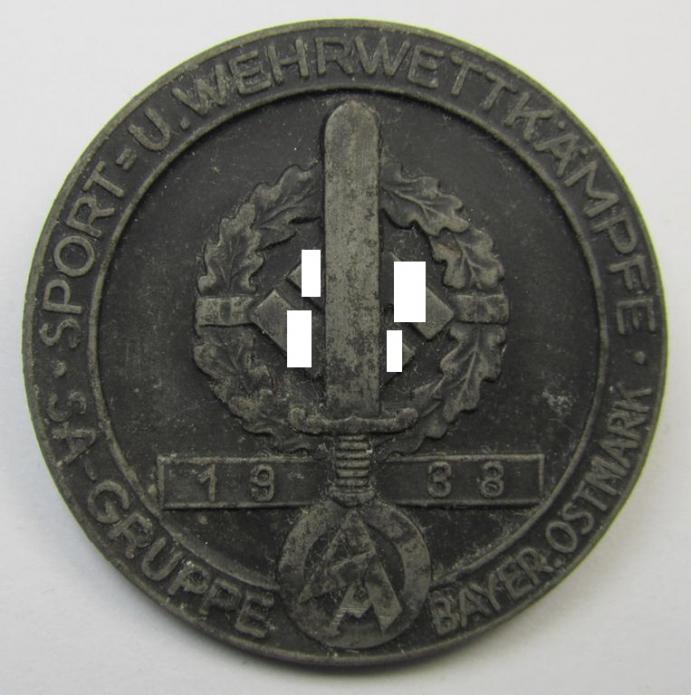 Aluminium-based, SA- (ie. 'Sturmabteilungen'-) related day-badge (ie. 'tinnie'), as was issued to commemorate an: 'SA'-gathering ie. rally entitled: 'Sport- u. Wettkämpfe - SA-Gruppe Bayer. Ostmark - 1938'