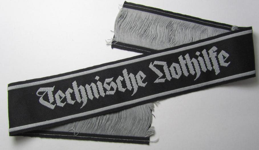 Attractive - and actually scarcely encountered! - example of a TeNo-cuff-title (ie. 'Ärmelstreifen') entitled: 'Technische Nothilfe' (= 'TeNo'), being an example as was woven in the neat 'BeVo'-weave pattern