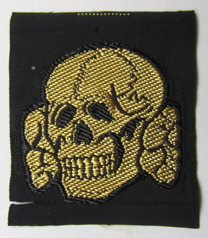 Attractive - and 'virtually mint- ie. unissued'! - example of a Waffen-SS cap-skull (being of the larger-sized model as was executed in neat 'BeVo'-weave pattern and being of the 'tropical'-version- ie. being a golden-yellow-coloured example)