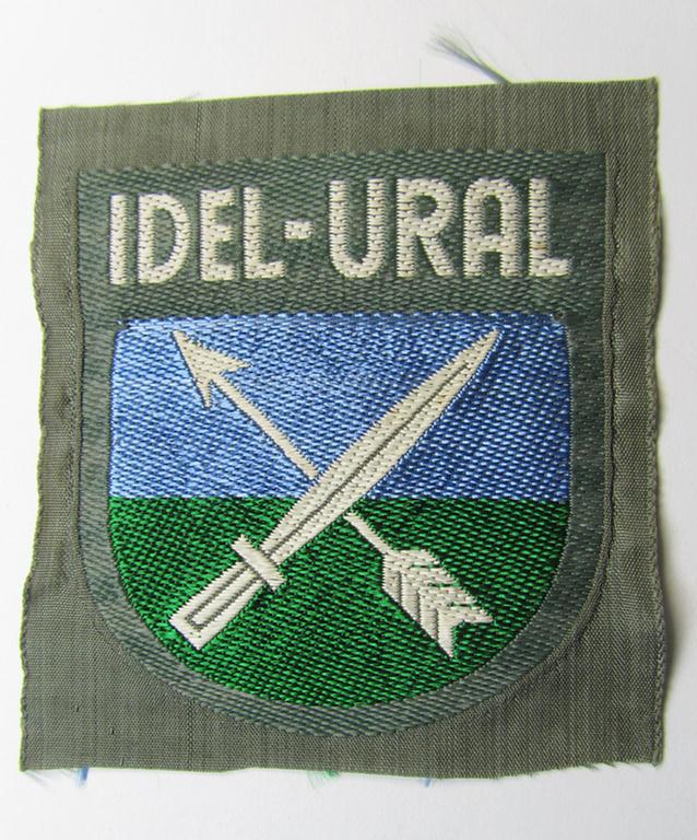 Multi-coloured- and/or 'BeVo'-woven armshield (ie. 'Ärmelschild') entitled: 'Idel-Ural' as was intended for usage by a volunteer who served within the 'Volga-Tartar Legion') and that comes in a 'virtually mint- ie. unissued', condition