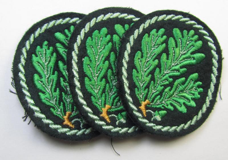 Attractive example of a WH (Heeres) so-called: 'Jäger'-armbadge, being a neatly machine-embroidered- and/or multi-coloured version as was executed on darker-green-coloured wool