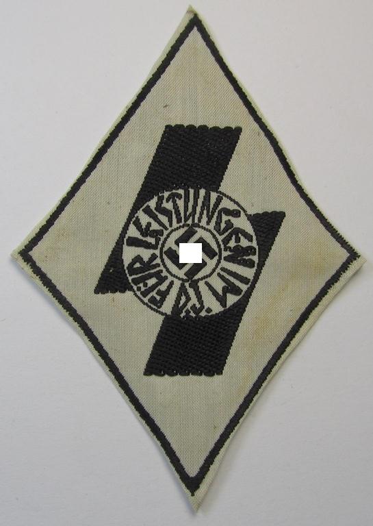 Superb - and rarely found! - DJ- (ie. 'Deutsches Jungvolk'-) so-called: 'Leistungsabzeichen in Schwarz' (or: black-class youth sports'-badge) being a cloth-based version as executed in the neat: 'BeVo'-weave pattern