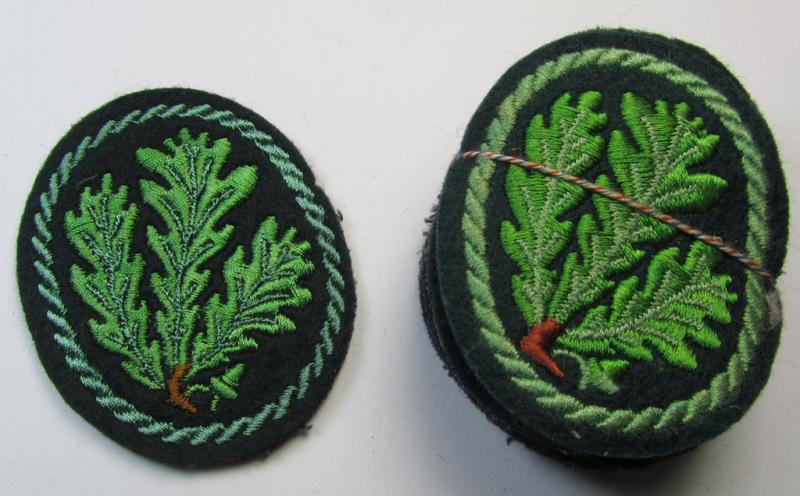 Attractive example of a WH (Heeres) so-called: 'Jäger'-armbadge, being a neatly machine-embroidered- and/or multi-coloured version as was executed on darker-green-coloured wool