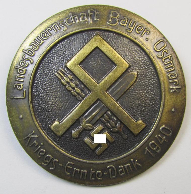 Superb, commemorative 'Reichsnährstand'- (ie. 'RNSt.'-) related 'tinnie' being a non-maker marked example depicting an Odal-rune- and swastika-device and text: 'Landesbauernschaft Bayer. Ostmark - Kriegs-Ernte-Dank 1940'