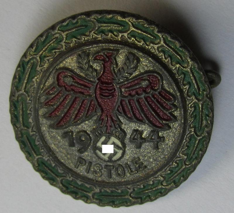 Attractive - and unusally seen! - multi-coloured enamelled (and zinc- ie. 'Feinzink'-based), smaller-sized, so-called: 'Gaumeisterabzeichen in Gold für Pistole 1944 des Standschützenverbandes Tirol-Vorarlberg'