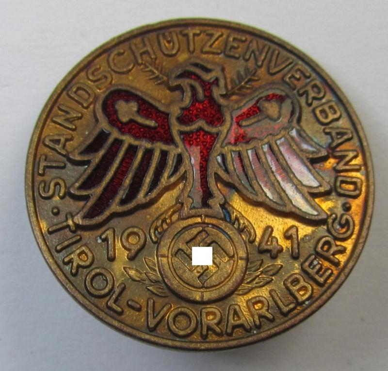 Attractive - and truly unusally seen! - red-coloured enamelled, smaller-sized, so-called: 'Gauleistungsabzeichen in Bronze für Kombinationsschiessen 1941 des Standschützenverbandes Tirol-Vorarlberg'