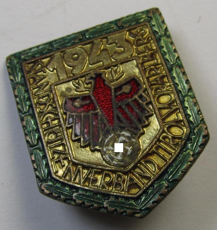 Attractive - and unusally seen! - multi-coloured enamelled, so-called: 'Gaumeisterabzeichen für Kombinationsschiessen in Gold mit Eichenlaub 1943 des Standschützenverbandes Tirol-Vorarlberg'