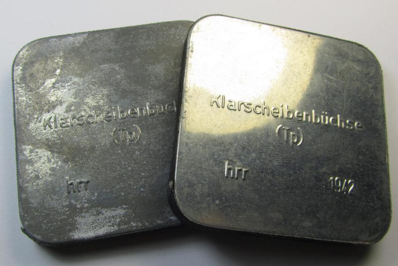 Unusal WH-equipment-item: a metal-based, square-sized box holding a pair of replacement gasmask-lenses for tropical-usage (ie. 'Klarscheibenbüchse - Tp') being a mint- ie. unissued example that bears a 3-digit maker-code ('hrr') and/or date: '1942'