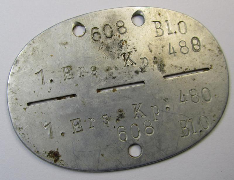 Aluminium-based, WH (Heeres) ie. 'Infanterie'-related ID-disc bearing the clearly stamped unit-designation that simply reads: '1.Ers.Kp. 480' and that comes as issued- and/or worn