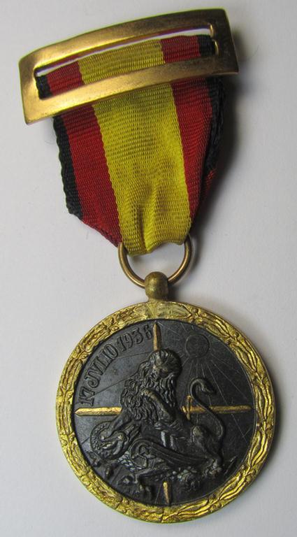 Spanish-issued, Spanish Civil-War commemorative-medal called: 'Medalla de la Campaña 1936-1939' that comes mounted onto its (typically Spanish) mounted ribbon and that comes in a wonderful and hardly used condition