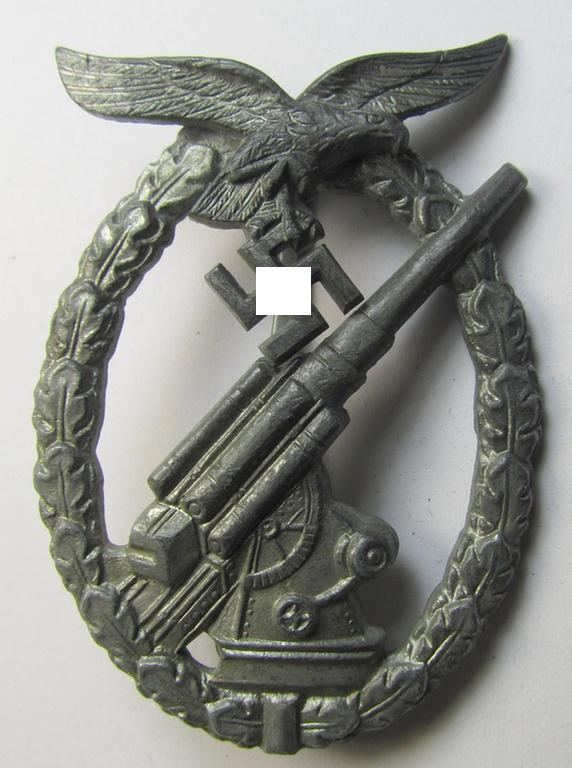 Superb - and rarely seen! - 'Feinzink'-based- example of a maker- (ie. 'ÜÜ'-) marked WH (Luftwaffe) 'Flakkampfabzeichen' (or: airforce anti-aircraft badge) being a very detailed example as was produced by the: the: 'E. Ferd. Wiedmann'-company