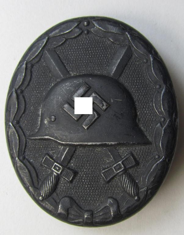 Attractive - and neatly maker- (ie. 'L/56'-) marked! - example of a black-class wound-badge (or: 'Verwundeten-Abzeichen in Schwarz') as was produced by the maker (ie. 'Hersteller'): 'Funcke & Brüninghaus'