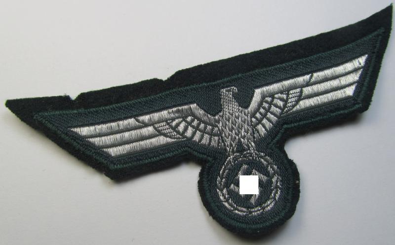 WH (Heeres) breast-eagle as executed in 'BeVo'-type-, so-called: 'flat-wire'-weave-pattern and pre-mounted on darker-green-coloured wool as was specifically intended for usage by soldiers (ie. NCOs) on their dress-tunics (ie. 'Waffenröcke')