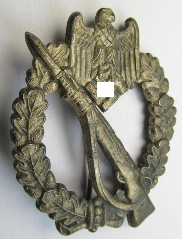 Attractive - and moderately used! - 'Infanterie-Sturmabzeichen in Silber' (or: silver-class infantry-assault badge ie. IAB) being a neatly maker- (ie. 'F.O.'- or: 'Friedrich Orth'-) marked example as executed in silverish-coloured 'Feinzink'