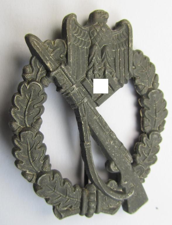 Attractive, 'hollow-back' 'Infanterie Sturmabzeichen in Silber' (or: silver infantry-assault badge ie. IAB) being a non-maker-marked example as executed in zinc-based metal (ie. 'Feinzink') as was produced by the: 'Wilh. Deumer'-company