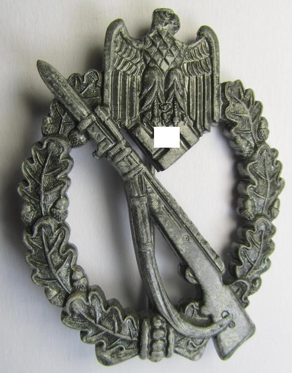 Attractive - and moderately used! - 'Infanterie-Sturmabzeichen in Silber' (or: silver-class infantry-assault badge ie. IAB) being a neatly maker- (ie. 'MK 1'- or: 'Metall u. Kunststoff'-) marked example as executed in silverish-coloured 'Feinzink'