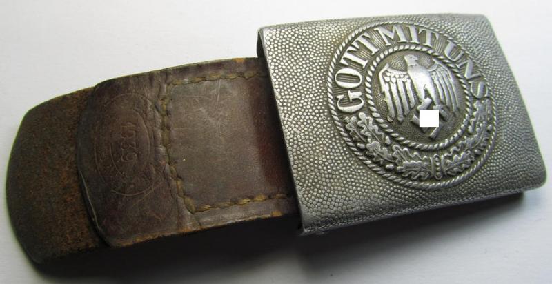 WH (Heeres) 'standard-pattern', aluminium-based belt-buckle (ie. 'Koppelschloss für Uffz. u. Mannschaften des Heeres') being a maker- (ie. 'C.T. Dicke'-) marked- and/or '1939'-dated example that comes mounted onto its leather-based tab