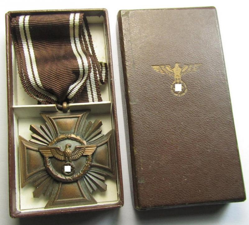 Superb, 'N.S.D.A.P. Dienstauszeichnung in Bronze' (ie. '3. Stufe für 10 Jahre t. D.') being a non-maker-marked- (and 'regular-weight') example that comes with its period (long-sized!) ribbon as stored in its (rarely seen!) two-pieced etui