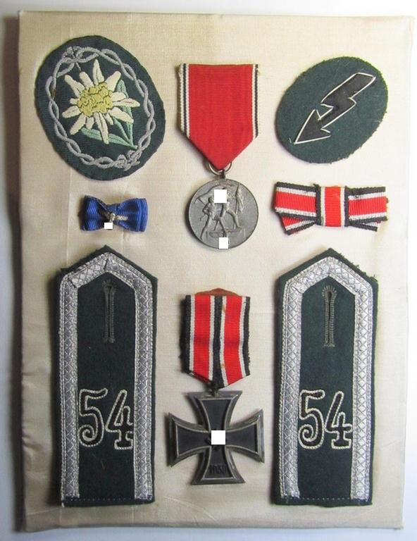 8-pieced WH (Heeres) 'Gebirgsjäger'-related insignia- and/or award-grouping that belonged to a soldier (ie. NCO ie. 'Unteroffizier') who served within the: 'Gebirgs-Pionier-Bataillon 54' and that comes mounted onto a period-compiled 'card'