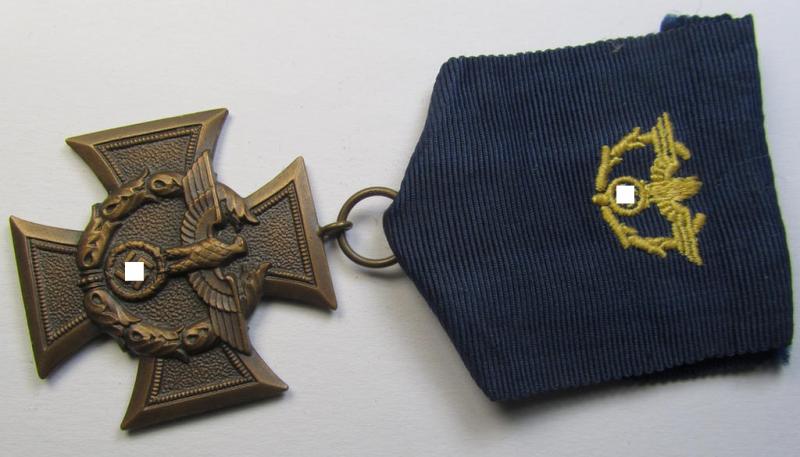 Superb, so-called: 'Zollgrenzschütz-Ehrenzeichen' (or: customs loyal-service medal) that comes mounted onto its (scarcely seen!) ribbon (ie. 'Bandabschnitt') showing a neat interwoven, bright-yellow-toned  'Zollgrenzschütz'-eagle-device