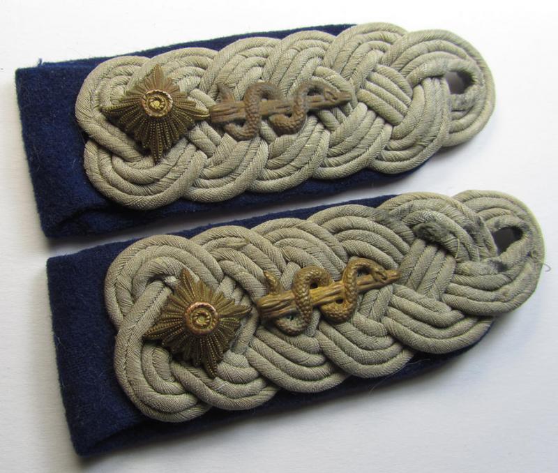 Attractive - and fully matching! - pair of WH (Heeres) neatly 'cyphered', officers'-type shoulderboards as piped in darker-blue-coloured branchcolour as was intended for usage by a: 'Oberstleutnant u. Arzt' who served within the: 'Sanitäts-Truppen'