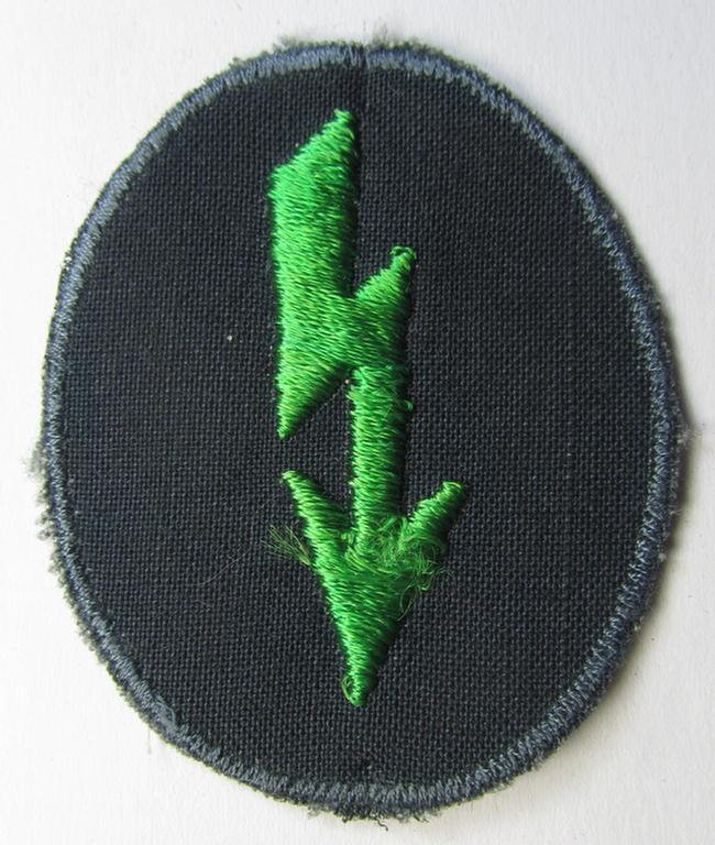 'Variant-pattern', WH (Heeres) trade- and/or special-career insignia ie. machine-embroidered signal-blitz (as executed in bright-green coloured linnen on a 'thin-shaped background) as was intended for a soldier serving within the: 'Pz.-Gren.-Truppen'