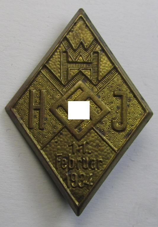 Attractive - and scarcely encountered! - HJ- (Hitlerjugend-) ie. WHW-related day-badge (ie. 'tinnie' or: 'Veranstaltungsabzeichen') as was issued to commemorate a HJ- ie. WHW-related gathering ie. rally held on the 11th of February 1934'