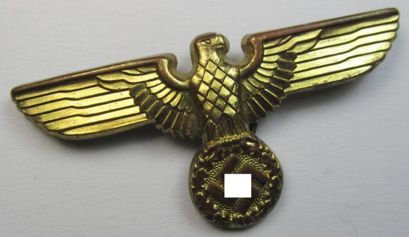 Attractive - moderately used- and bright-golden-coloured- (and/or: 'Buntmetall'-based) (political-style) visor- (ie. 'Schirmmützen'-) cap-eagle being a detailed example that is neatly: 'RzM' and/or 'M1/105' marked on its back