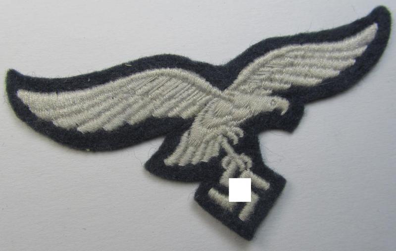Neat, 'mint- ie. unissued' example of a WH (Luftwaffe) 'standard-issue'-pattern breast-eagle (ie. 'Brustadler für Mannschaften u. Uffz. der Luftwaffe') being a machine-embroidered example as was worn throughout the war