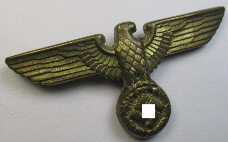 Attractive - moderately used- and bright-golden-coloured- (and/or: 'Buntmetall'-based) (political-style) visor- (ie. 'Schirmmützen'-) cap-eagle being a detailed example that is neatly: 'RzM' and/or 'M1/24' marked on its back