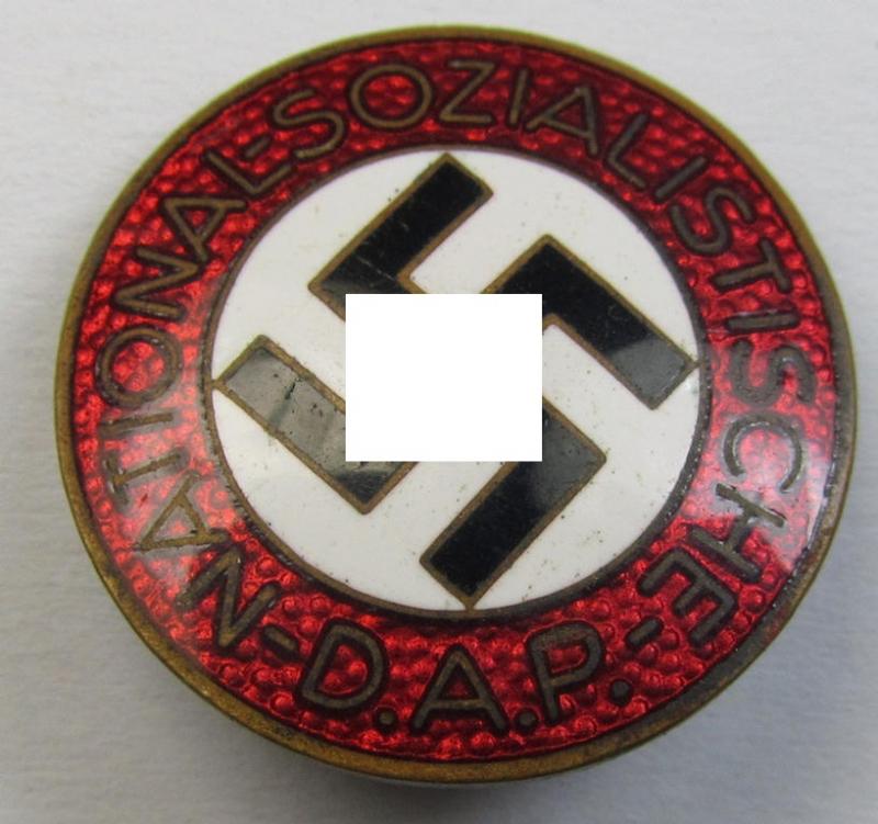 Neatly enamelled- (and bright-red-coloured) 'N.S.D.A.P.'-membership-pin- ie. party-badge (or: 'Parteiabzeichen') which is nicely maker-marked on its back with the makers'-designation: 'RzM' and/or: 'M1/8'