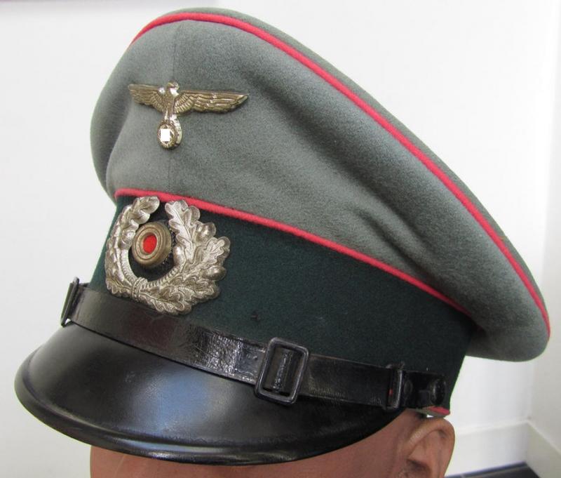 Superb example of a WH (Heeres) bright-pink-piped, EM- (ie. NCO-) type visor-cap 'Schirmmütze für Mannschaften u. Unteroffiziere der Panzer- o. Panzerjäger-Truppen' and that comes in a truly wonderful- and totally untouched, condition