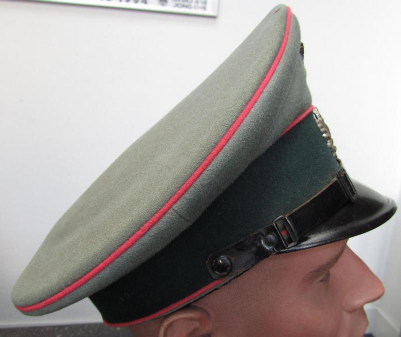 Superb example of a WH (Heeres) bright-pink-piped, EM- (ie. NCO-) type visor-cap 'Schirmmütze für Mannschaften u. Unteroffiziere der Panzer- o. Panzerjäger-Truppen' and that comes in a truly wonderful- and totally untouched, condition