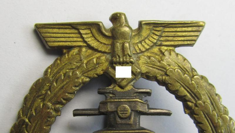 Stunning, WH (KM) 'Flottenkriegsabzeichen' (or: high-sea fleet badge) being a typical: 'Buntmetall'- (ie. 'Tombak'-) based and/or (I deem) early-war-period specimen that is neatly maker- (ie. 'Fec. Adolf Bock') marked on its back