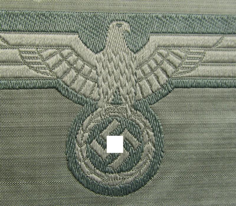 WH (Heeres) mid-war-period- and/or greyish-coloured breast-eagle of the so-called: 'M41'- (ie. 'M43'-) pattern 'Brustadler für Mannschaften u. Unteroffiziere') as executed in the neat 'BeVo'-weave pattern on a field-grey-coloured background