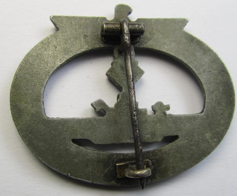 Later-war-period, WH (KM) typical zinc- (ie. 'Feinzink'-) based, so-called: 'U-Bootkriegsabzeichen' (or: U-boat war-badge) being a non-maker-marked example as was - I deem - produced by the: 'Funcke & Brünninghaus'-company