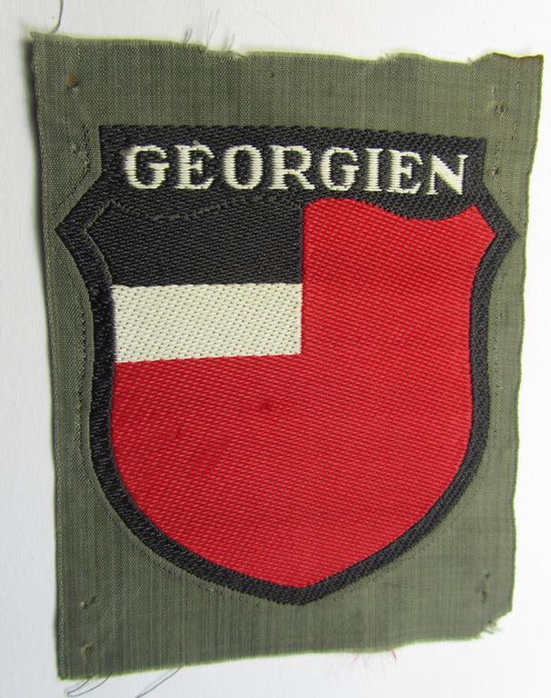 'BeVo'-type armshield entitled: 'Georgien' (being a 'virtually mint- ie. unissued' example as intended for a volunteer who served within the 'Deutsche Wehrmacht' ie. within the 'Georgisches Legion')