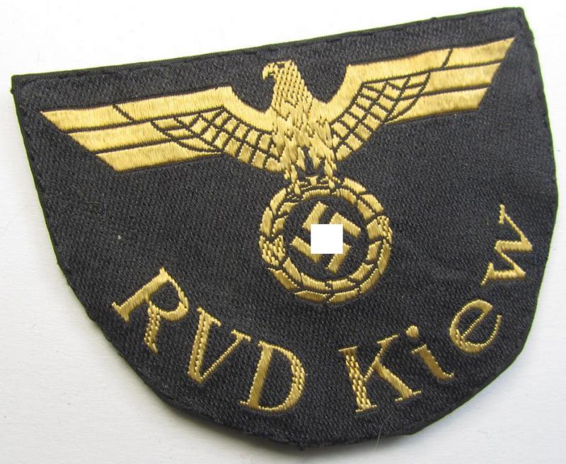RB- ('Reichsbahn'-) related arm-eagle as executed in 'BeVo'-weave style as was intended for an official of the: 'Deutsche Reichsbahn' ie. the 'RVD Kiew' (or: 'Reichsbahn-Verkehrs-Direktion Kiew')