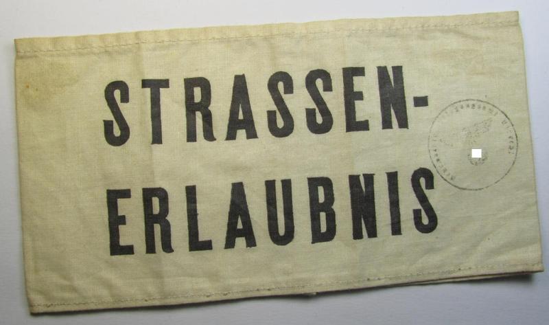 Attractive - and most certainly not that often seen! - Dutch-related armband (ie. 'Armbinde') being of the 'entirely printed'-type showing the text: 'Strassen-Erlaubnis' and showing a hard-to-decypher ink-stamp (ie. 'Dienstsiegel')