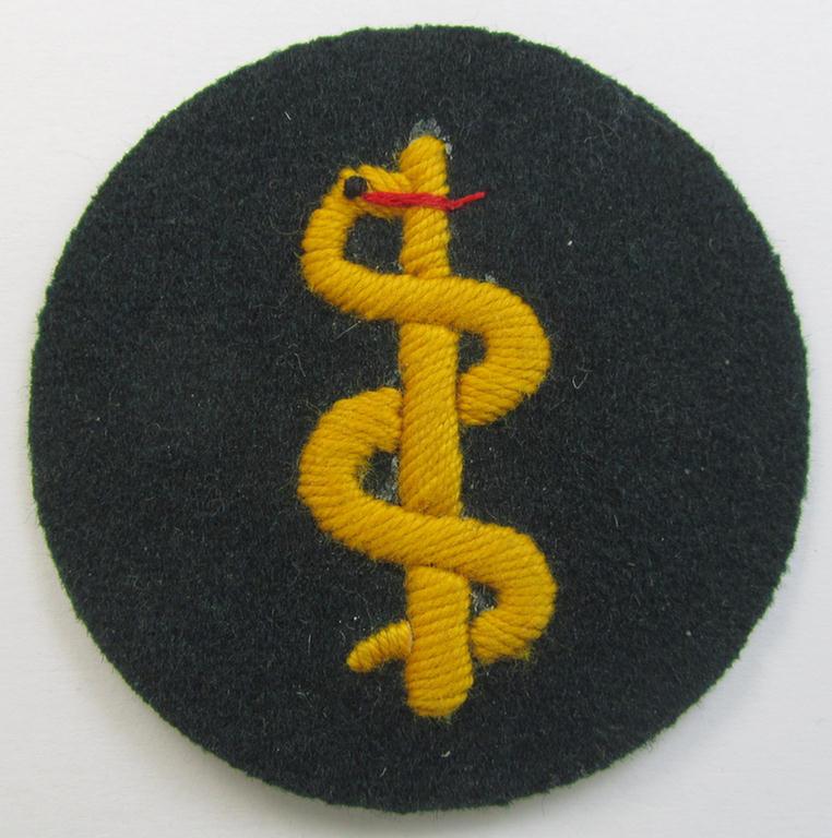 Neatly hand-embroidered WH (Heeres) trade- and/or special-career insignia (ie.: 'Heeres-Tätigkeitsabzeichen') as was specifically intended for usage by: 'Sanitätspersonal' (or: medical orderlies- ie. staff)