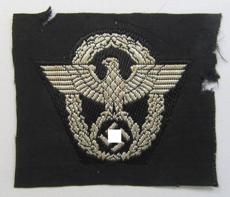 Attractive - and nowadays scarcely encountered! - police ie. 'Polizei'- (ie. 'SS-Polizei'-) 'BeVo'-woven-style cap-eagle (ie. 'Adler für Schiffchen o. Einheitsfeldmütze') that comes in an overall very nice- (ie. 'virtually mint'-), condition