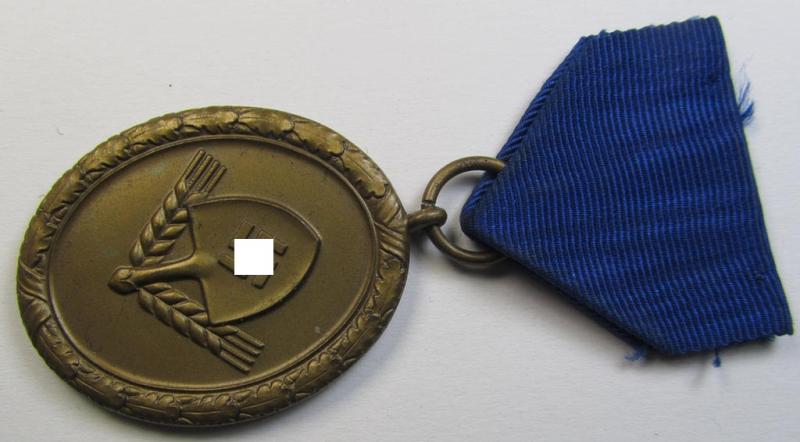 Attractive example of a: RAD (ie. 'Reichsarbeitsdienst') so-called: 'Dienstauszeichnung 4. Stufe für Männer' as was intended for 4 years loyal-service and that comes mounted onto its period piece of ribbon (ie. 'Bandabschnitt')